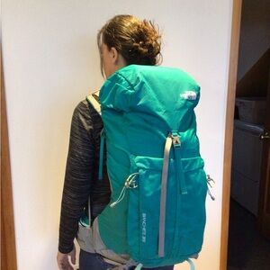 The North Face Blue Backpack with Padded Straps and Durable Material